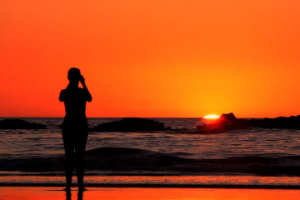 Woman-Looking-at-Sunset