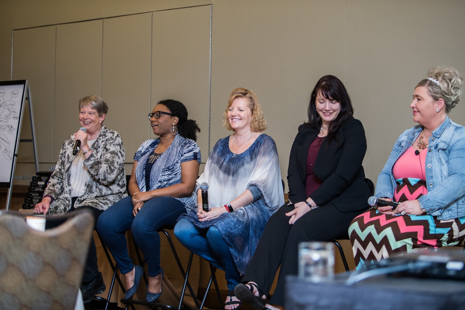 Five women talk on a panel at Women Who Test